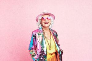 happy, bright coloured elderly woman